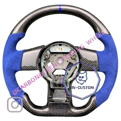 Volante CARBONO REAL PARA NISSAN 350Z CON AZUL (CON BOTONES DE FIBRA DE CARBONO) Foto 1 de 2