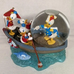 Globo de nieve musical raro Disney Pato Donald Huey Dewey Louie EL EXPLORADOR MARINO - Imagen 1 de 4