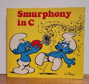Puffi da collezione "Smurphony In C" libro per bambini di Peyo 1982 casa casuale  - Foto 1 di 1