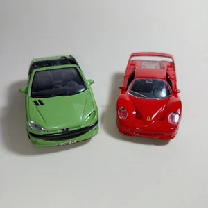 Peugeot 206 cc 1/38 Welly + Ferrari F50 1/39 Maisto - Foto 1 di 5