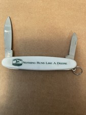JOHN DEERE "NOTHING RUNS LIKE A DEERE" WHITE TWO BLADE POCKET KNIFE, NEW 