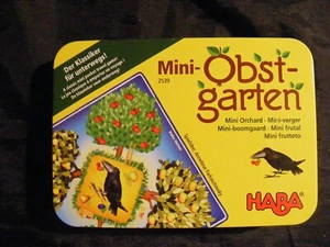 Juego de huerto HABA - Fruta, troquel y tablero de madera - Mini huerto en lata - Imagen 1 de 3