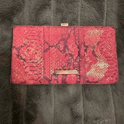 Cartera Kenneth Cole Reaction rosa morado Foto 1 de 4