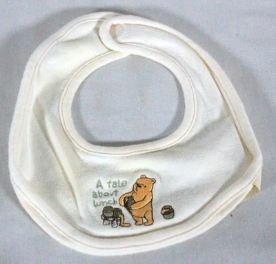 Babero Disney Classic Pooh recién nacido blanco roto bordado "un tale about lunch" evc Foto 1 de 4
