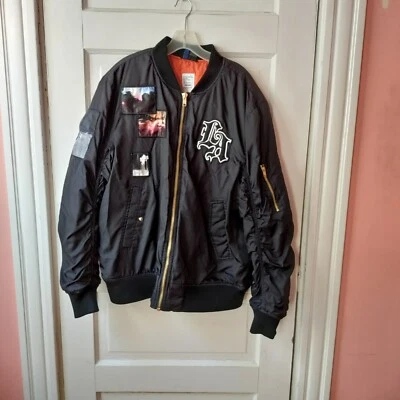 Chaqueta Ligera DIVIDED by H&M Negra con Parches Militares-Talla Grande Foto 1 de 4