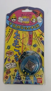 Bandai Tamagotchi Translucent 1996 blue & Yellow Digital - Picture 1 of 2