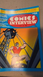 Comics Interview #33 FN; Fictioneer | Steelgrip Starkey - mit Tasche + Brett - Bild 1 von 2