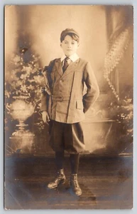Postcard RPPC Boy with Roller Skates Slung Over Shoulder Real Photo Young Man - Picture 1 of 2