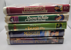 Disney VHS lot in Clamshell. Treasure Planet and more classic movies