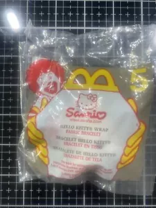 Bracciale tessuto avvolgente Hello Kitty 1999 - 2000 - McDonalds Happy Meal Toy - #5 - Foto 1 di 3