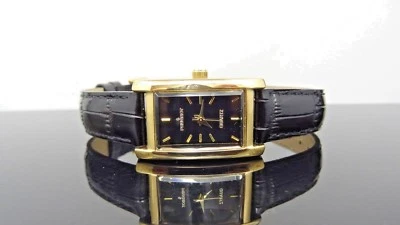 Reloj para mujer Peugeot 3007 rectangular tono dorado esfera negra y correa de cuero Foto 1 de 4