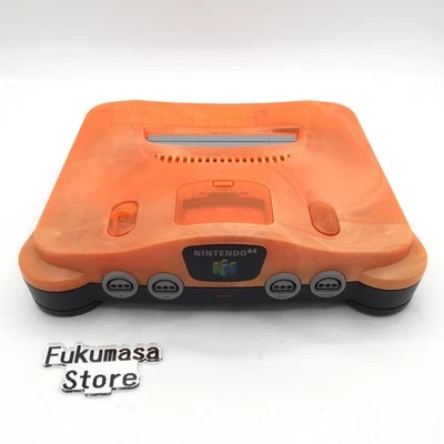 Consola Nintendo 64 solo naranja transparente Daiei Hawks N64 hecha en Japón probada Foto 1 de 4