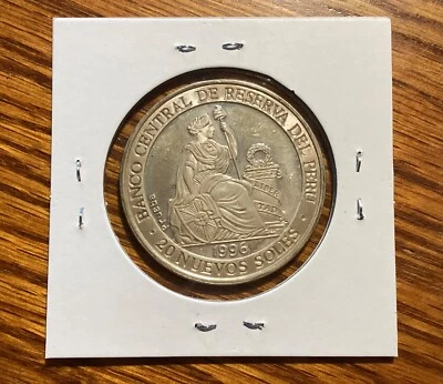 Peru 1996 Lrg.C/N pattern 20 S Olympic Flame Silver Coin (Rare)Mintage 25 - Image 1 of 3