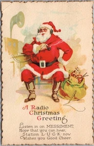 1927 SANTA CLAUS Tarjeta Postal en Relieve "Radio Felicitación de Navidad" Tubo/Auriculares - Imagen 1 de 2