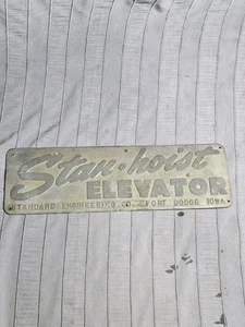 STAN-HOIST ELEVATOR Old Embossed Aluminum Advertising Sign FORT DODGE IOWA - Picture 1 of 6