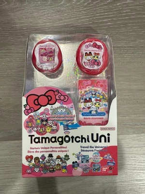 NUEVO Caja Sellada Tamagotchi Uni Sanrio Virtual Mascota Rojo Hello Kitty Arcos Foto 1 de 2