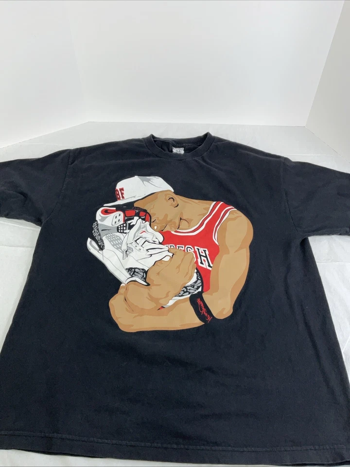 Bobby Fresh “Jordan Holding 4’s” Black Graphic Print T Shirt Mens Sz: XL - Image 1 of 4