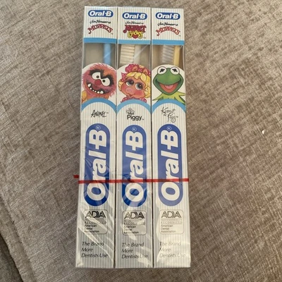 6 Vintage Oral-B Toothbrush Lot Compact Head ￼Factory sealed Nos Muppets - Image 1 of 3