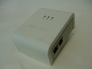NETGEAR 85 Mbps WALL PLUGGED ETHERNET SWITCH XE104 - Picture 1 of 3