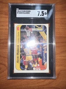 1986-87 Fleer Sticker #9 Akeem Olajuwon graded SGC 7.5 NM+ - Picture 1 of 2