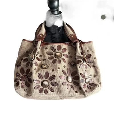 Bolso de hombro de lona tejido ancho fósil madera detalles de flores logotipo clave etiqueta colgante Foto 1 de 4