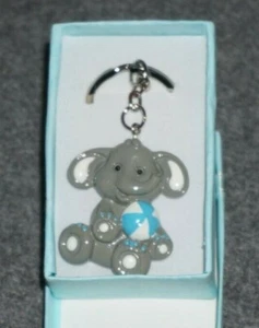 Key Chain of a Small Elephant Holding a Soccer Ball NIB - Picture 1 of 4