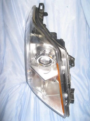 Faro derecho pasajero Cadillac SRX 22853873 halógeno lengüeta superior grieta intacta OEM Foto 1 de 4