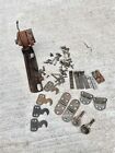 Antique singer hardware screws pieces off of an old sewing machine table
