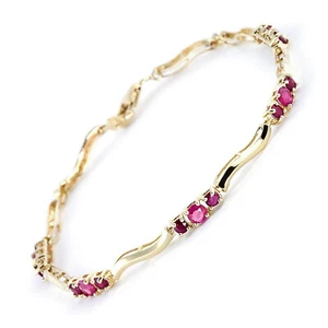 14K. GOLD TENNIS BRACELET WITH RUBIES & DIAMONDS (Yellow Gold) - Picture 1 of 5