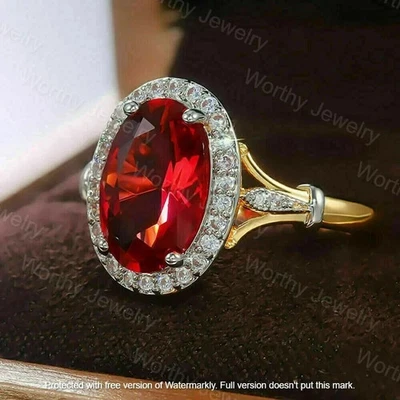 Anillo de compromiso con halo de diamantes rubí rojo creado en laboratorio de 3 quilates enchapado en oro amarillo de 14 quilates Foto 1 de 4