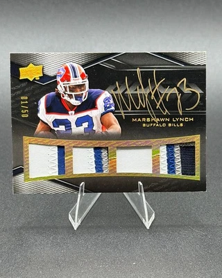 Marshawn Lynch 2009 Upper Deck Black Quad Game Used Patch Gold Ink Auto /50 - Image 1 of 2