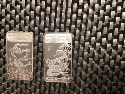 2012  & 2013 YEAR OF THE DRAGON & SNAKE 1/2 OZ 999 FINE SILVER BAR. 1 oz Total - Image 1 of 4