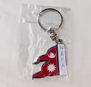 Nepal Flagge Souvenir Schlüsselanhänger Schlüsselring silberfarben neu im Paket - Bild 1 von 2