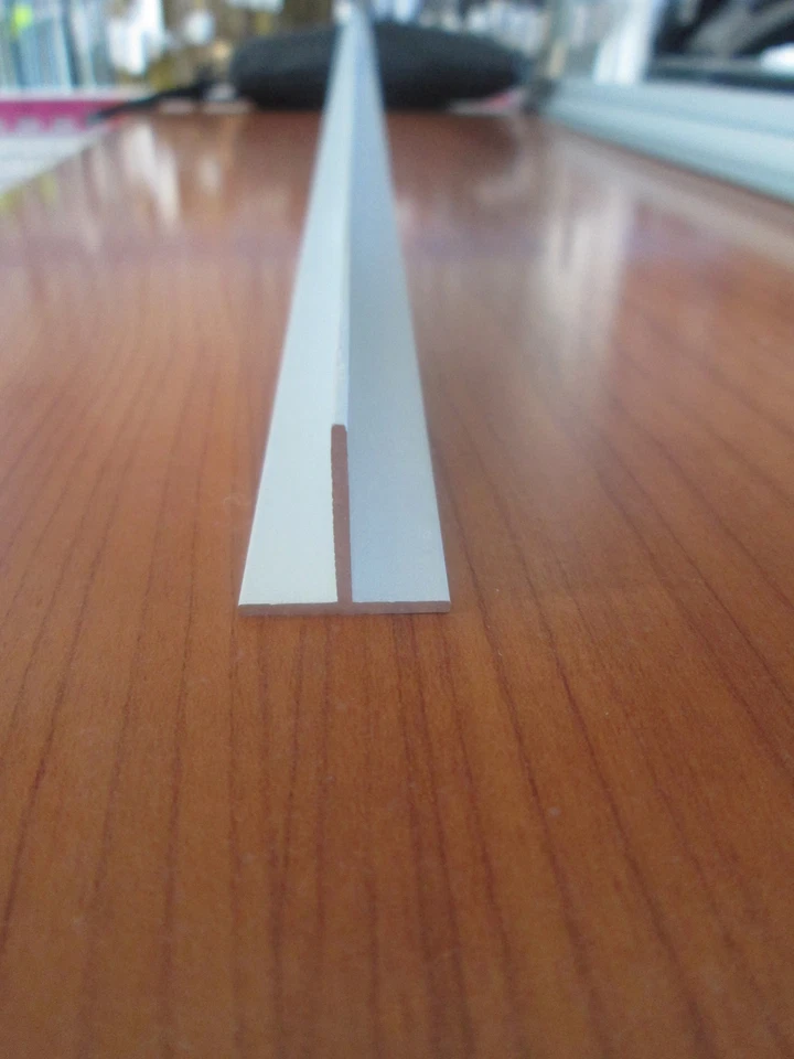 PZ 10 PROFILI IN ALLUMINIO ANODIZZATO ARGENTO A T  MM.25X25X1,5 DA MT 2 - Immagine 1 di 1