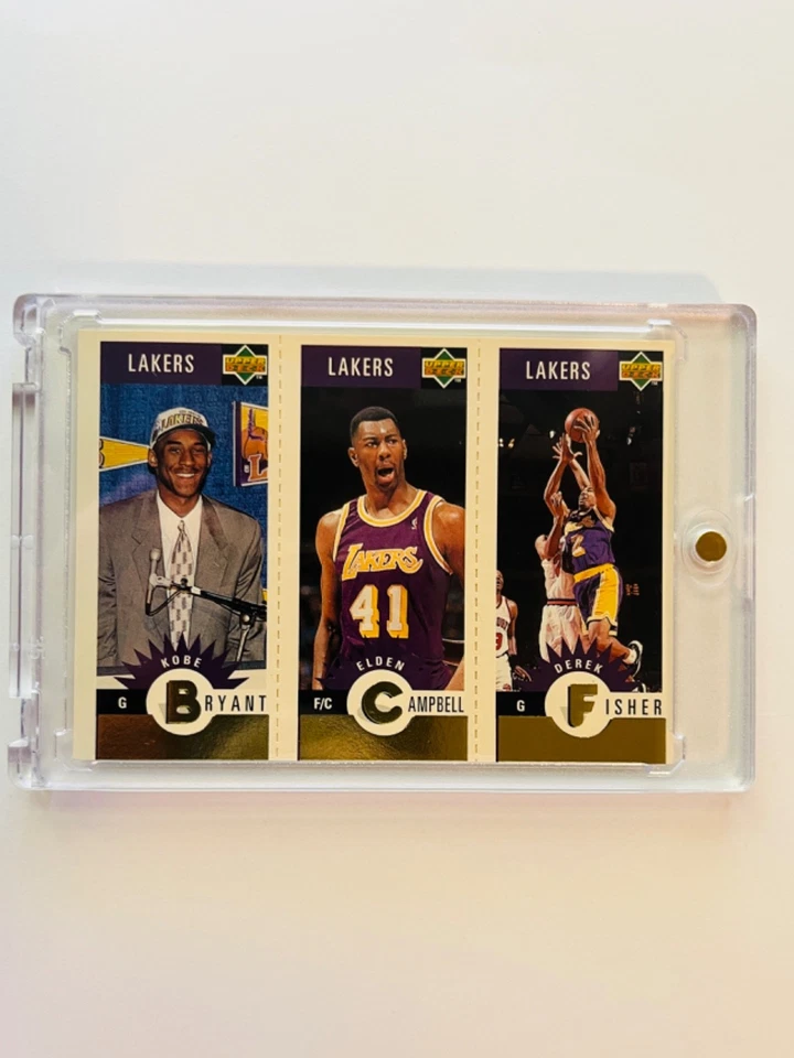 1996-97 Upper Deck Lakers Team Trio L1 Kobe Bryant, Elden Campbell, Derek Fisher Foto 1 de 2