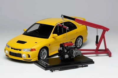 1/18 MotorHelix Mitsubishi Lancer Evoluzione IV Giallo Dandelion M84006 - Immagine 1 di 4