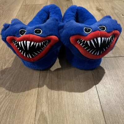 RARE POPPY PLUSH SLIPPERS. BRAND NEW. ADULT SIZE Large/XLarge FUN - Image 1 of 4