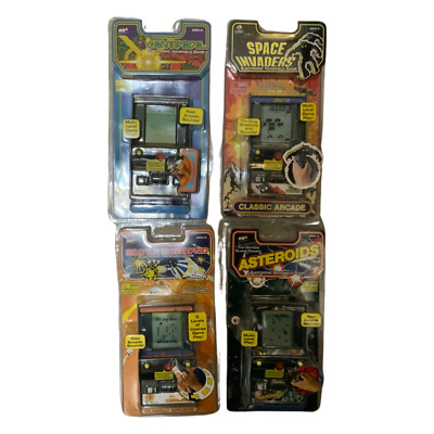Set of 4 Handheld Mini The Ultimate Arcade Classic Games by MGA Entertainment