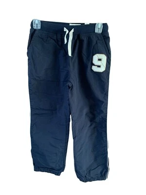 Pantalones deportivos a rayas azules blancos talla 10 The Childrens Place para niños Track Jogger Nylo Foto 1 de 4