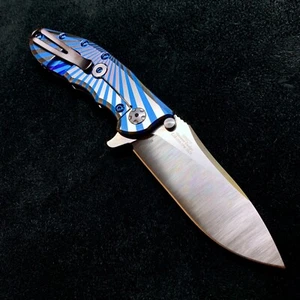 Zero Tolerance 0562CF Flipper Rick Hinderer Plain Edge Light Blue Starburst NEW - Picture 1 of 10