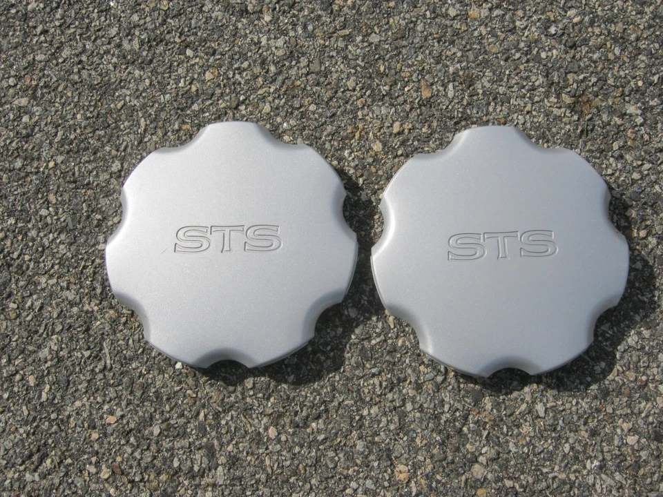 Tapacubos centrales originales 1996 1997 Cadillac Seville STS pintados en plata Foto 1 de 4