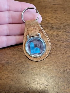 Llavero de colección 1980 Juegos Olímpicos de Invierno Lago Plácido Anillo Cuero Metal EE. UU. - Imagen 1 de 4