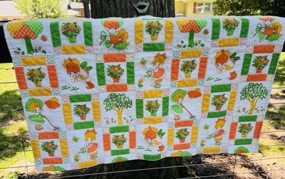 "Manta de bebé/cuna vintage acolchada con acabado 39"" cuadrados" Retro naranja/verde/amarillo Foto 1 de 4