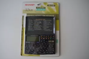 Neuf - Organisateur portable d'informations personnelles Sharp YO-140 32 Ko, calculatrice et + - Photo 1 sur 3
