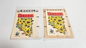 Menge 2 Vintage Impko Nevada Aufkleber Reise Tourismus Neu aus altem Lagerbestand - Bild 1 von 2