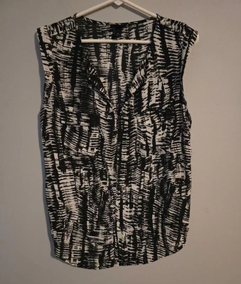 Blusa geométrica para mujer Mossimo blanca y negra con mangas de gorra talla mediana Foto 1 de 4