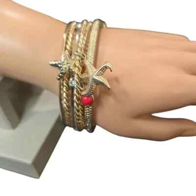 Brazalete Brazalete Pila Estrella de Mar Tono Dorado de Moda para Mujer Nuevo sin Etiquetas Foto 1 de 3