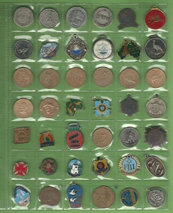 #PP. #4. LOT OF FORTY TWO (42) BADGES & TOKENS - Picture 1 of 2