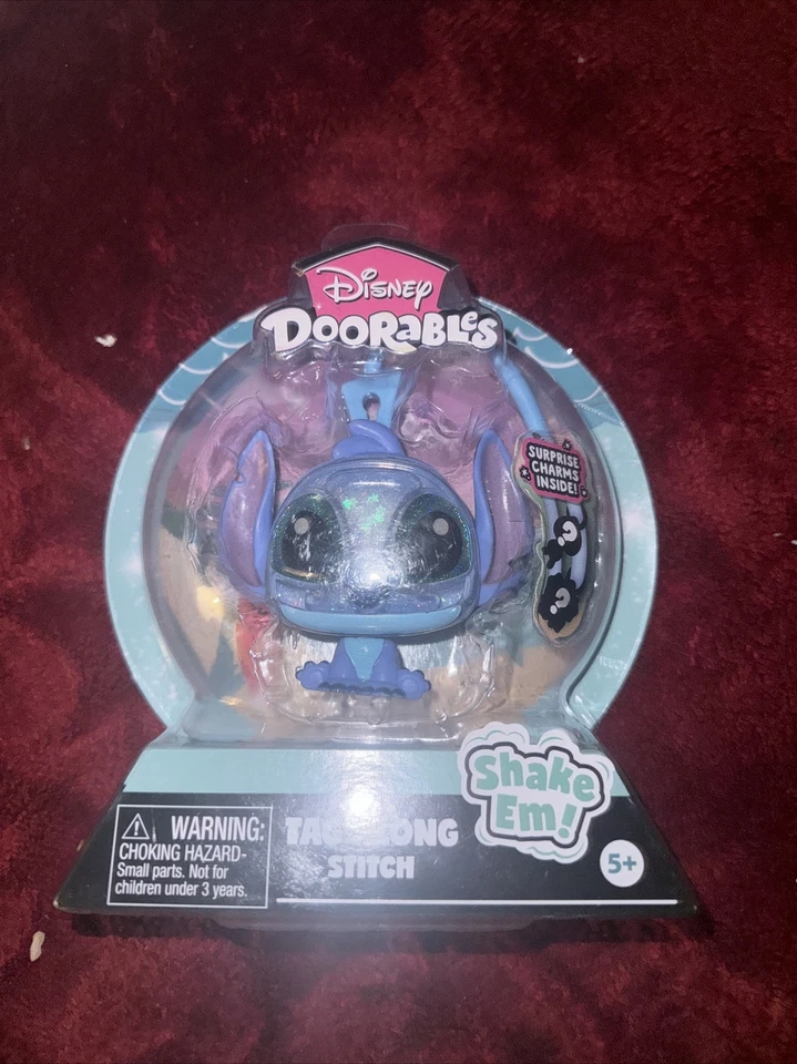 DISNEY DOORABLES Etiqueta a lo largo de la puntada con dijes sorpresa ¡NUEVO! Foto 1 de 1