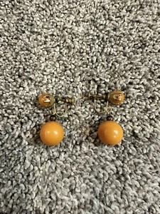 Orecchini vintage miele bachelite fondello a vite sfera testata antica tenuta - Foto 1 di 3